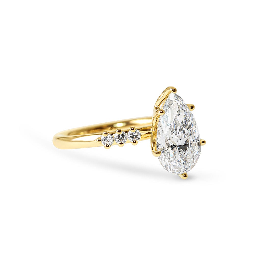 Phoenix Pear Cut Diamond Sidestones Engagement Ring