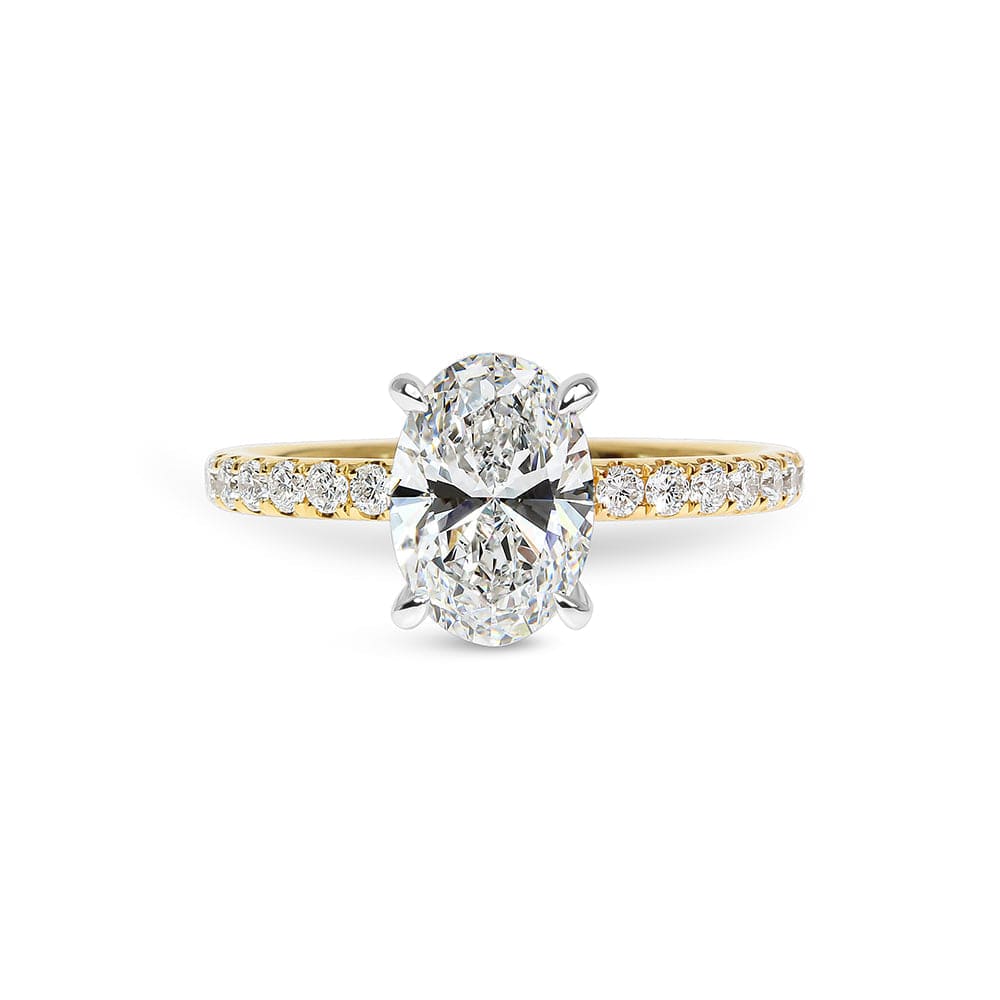 Haley Oval Cut Diamond & Sidestones Engagement Ring