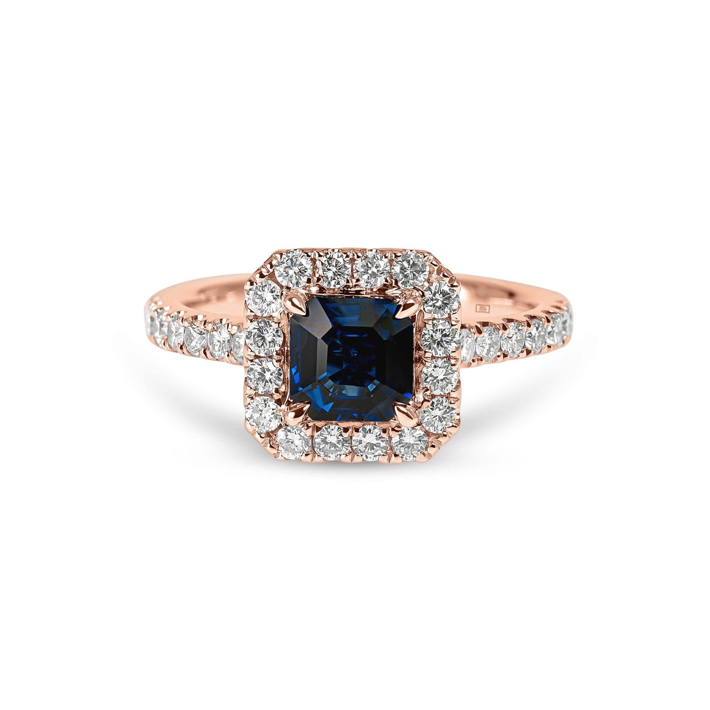 Emerald Cut Sapphire & Diamond Halo Ring