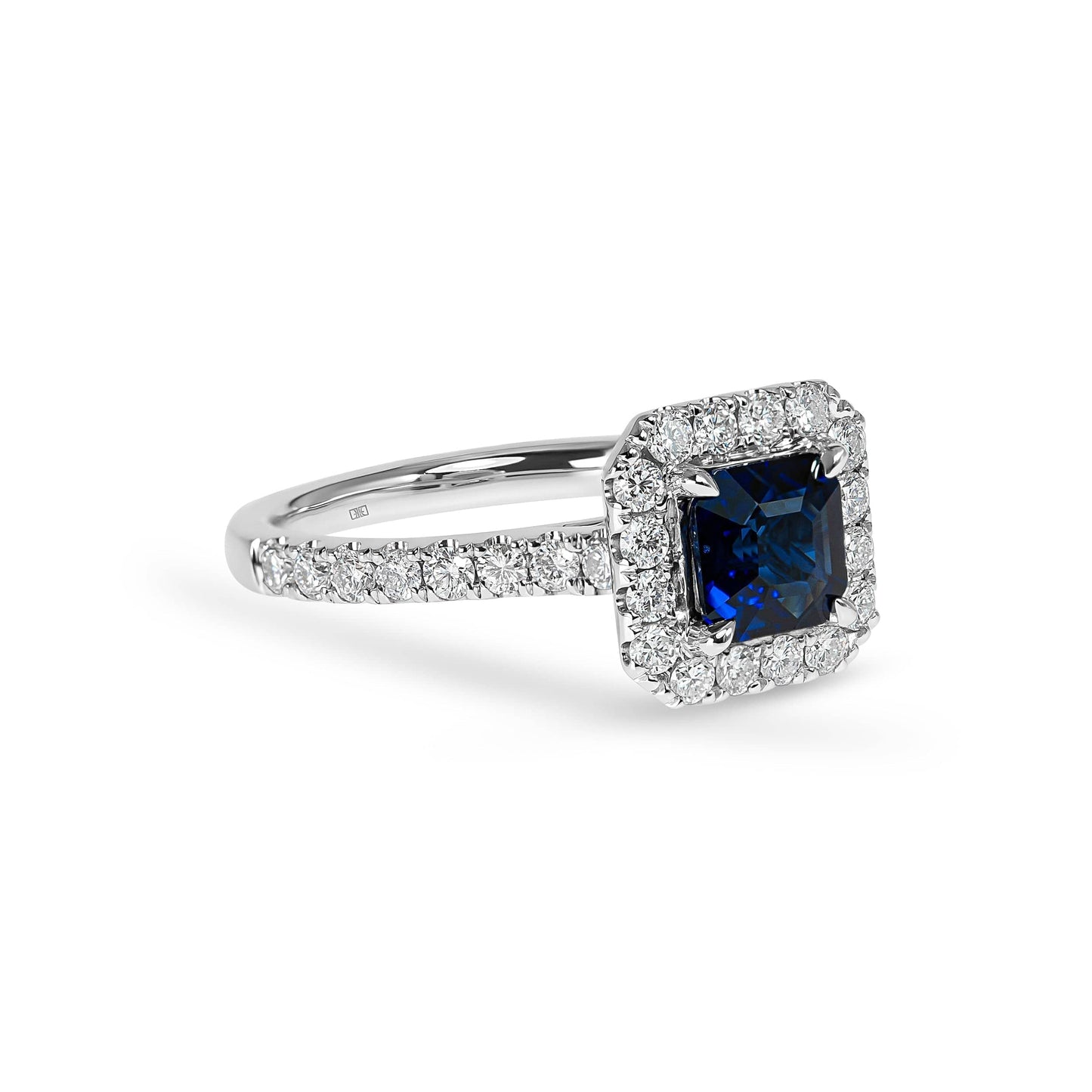 Emerald Cut Sapphire & Diamond Halo Ring