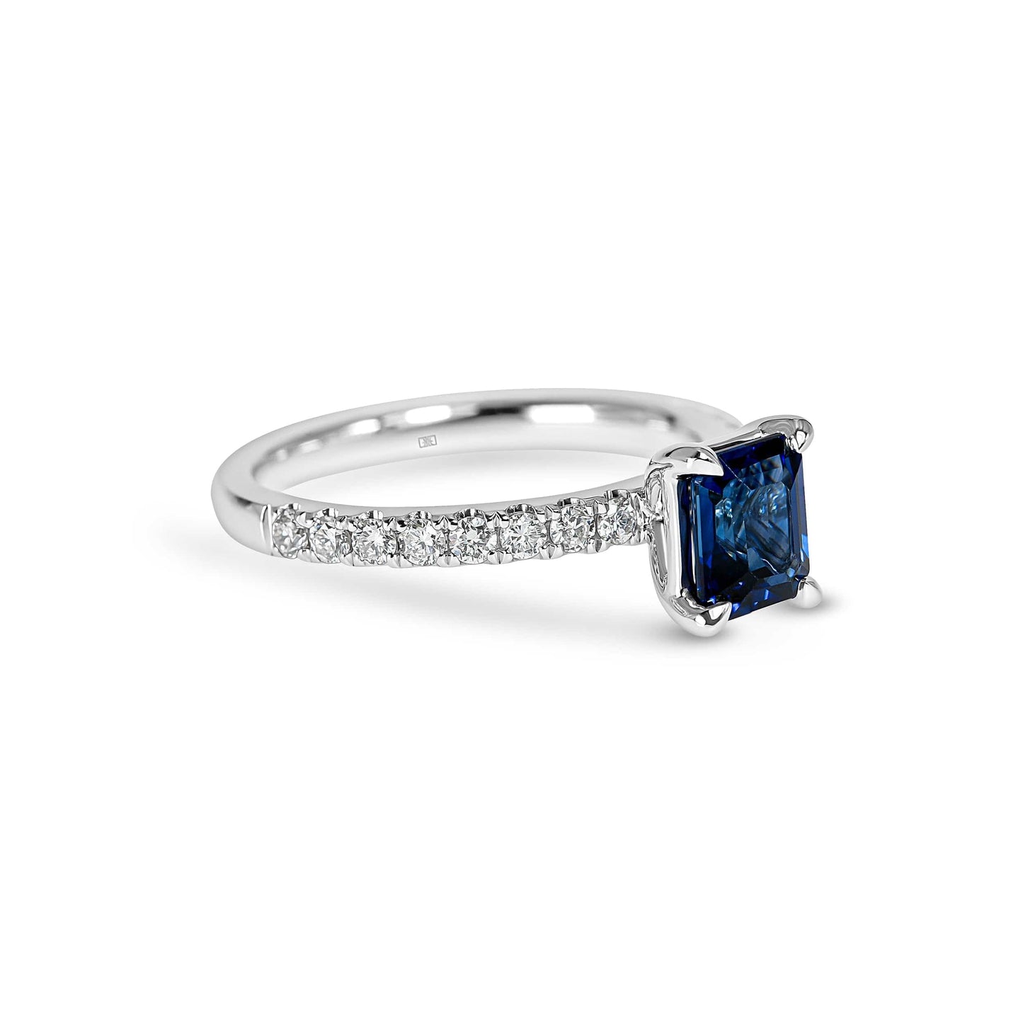 Emerald Cut Sapphire Solitaire & Pave Diamond Ring
