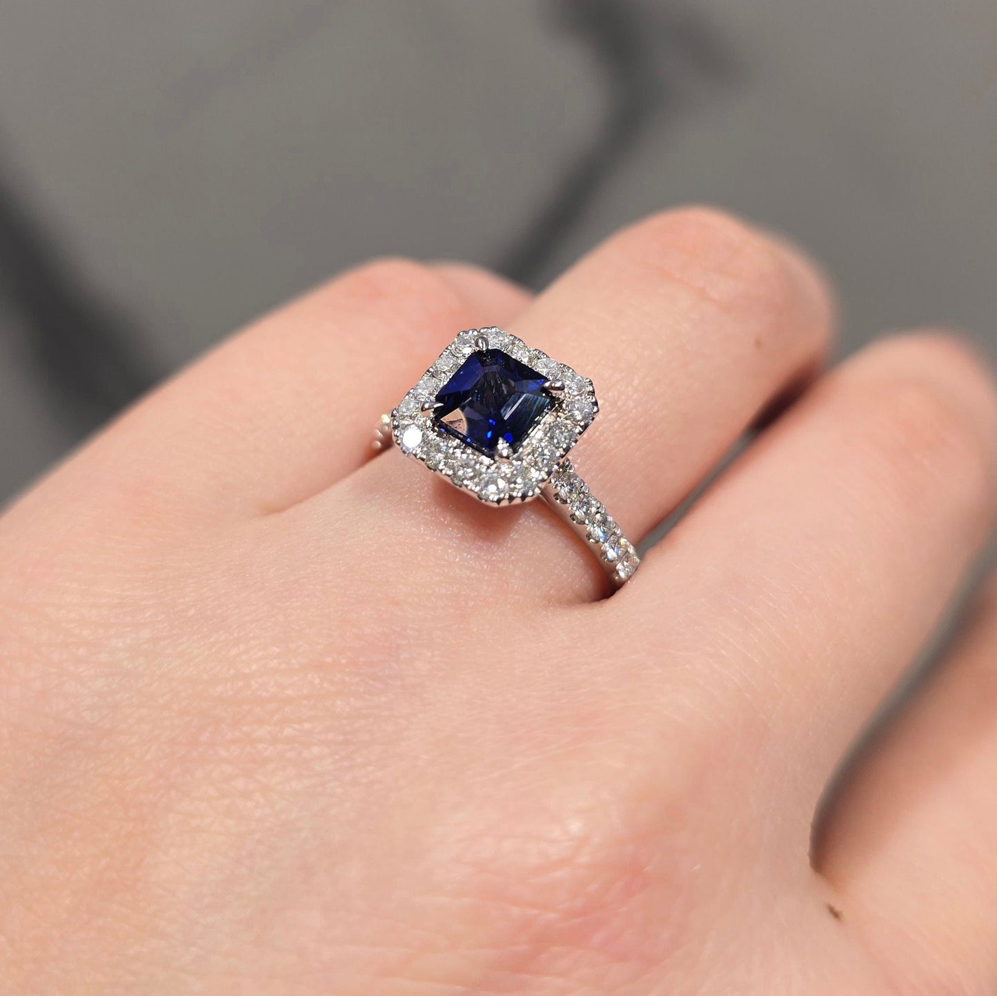 Emerald Cut Sapphire & Diamond Halo Ring
