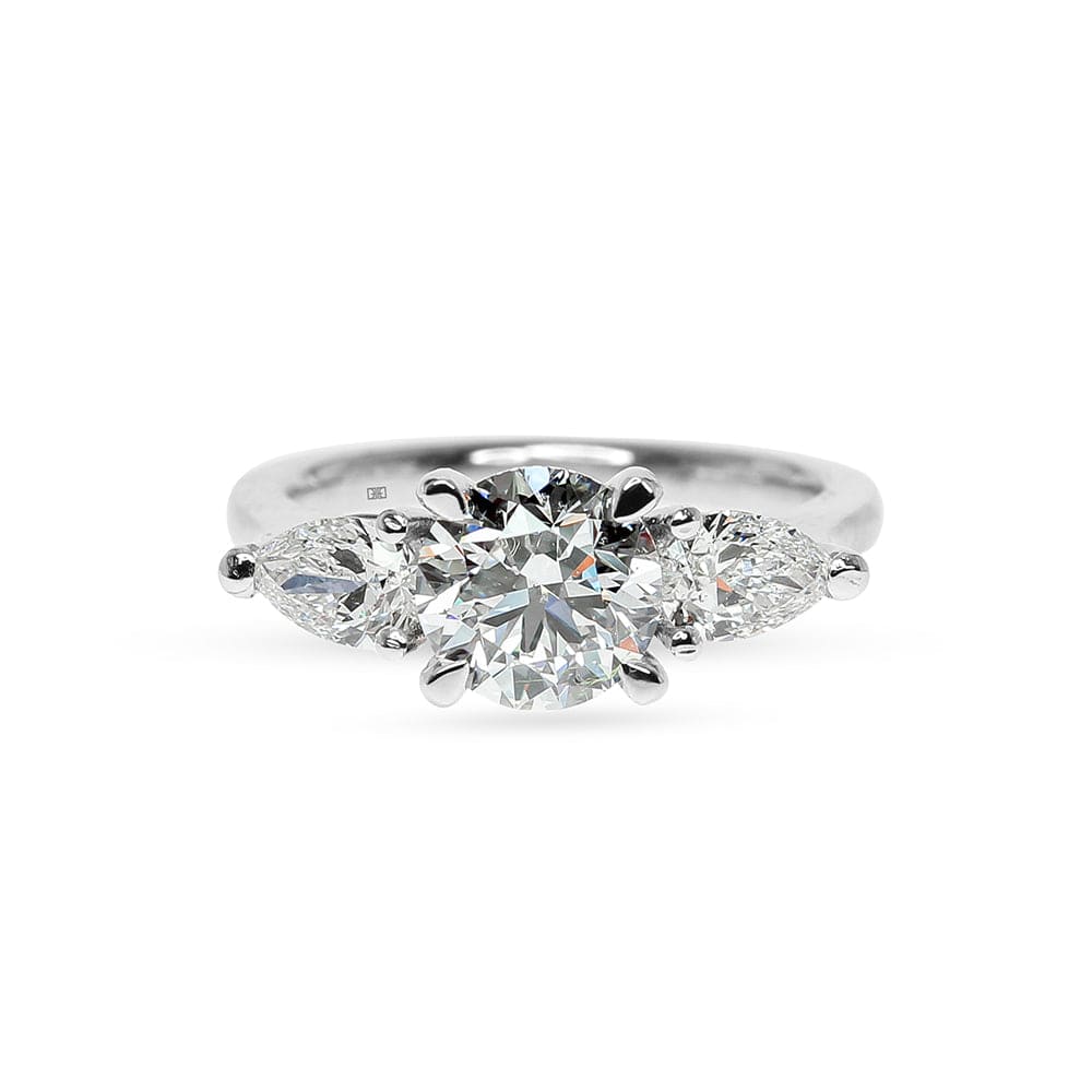 Vienna Tri-Stone Ring Round Diamond and Pear Sidestones Engagement Ring