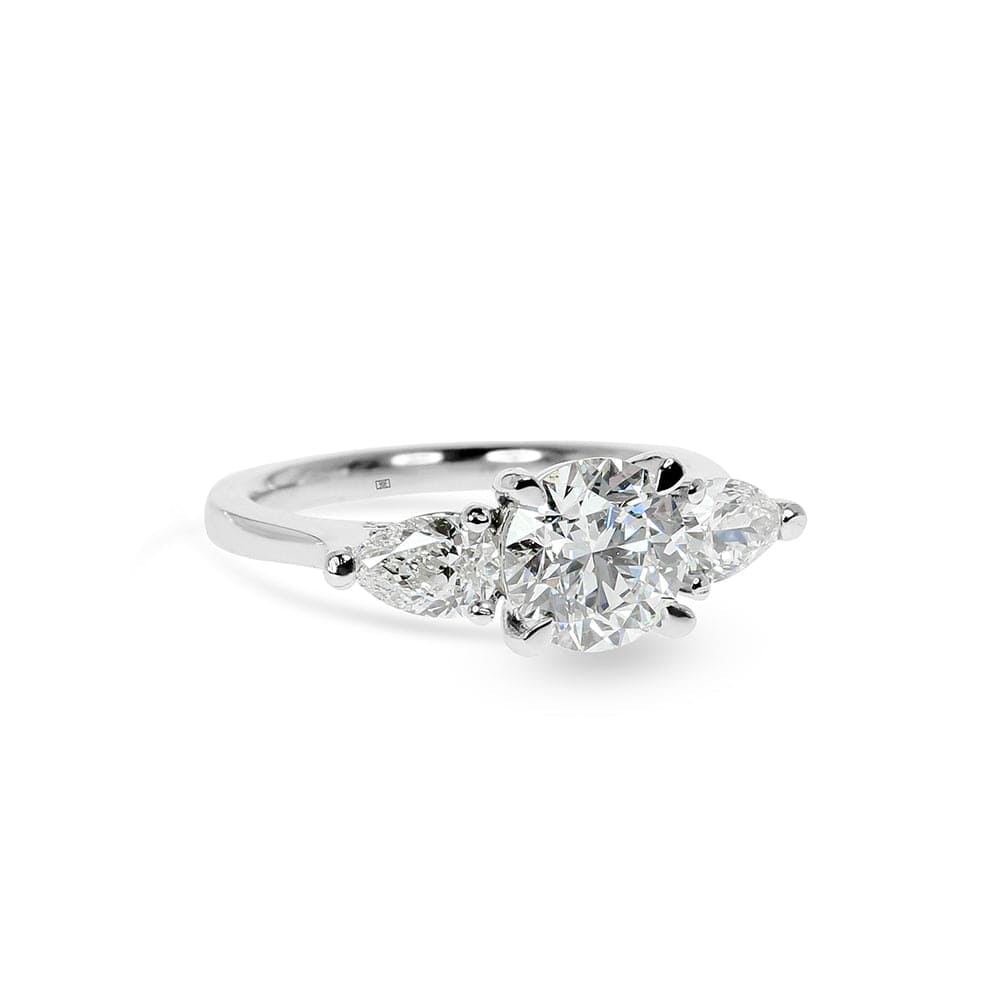Vienna Tri-Stone Ring Round Diamond and Pear Sidestones Engagement Ring