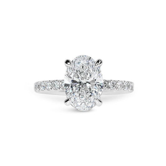Kendall Oval Cut Diamond with Hidden Halo & Sidestones Engagement Ring