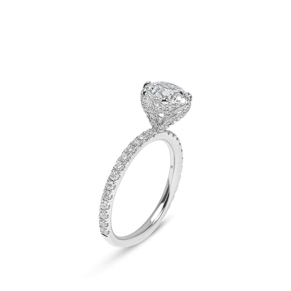 Melody Round Cut Diamond with Diamonds Basket & Sidestones Engagement Ring