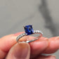 Emerald Cut Sapphire Solitaire & Pave Diamond Ring