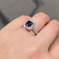 Emerald Cut Sapphire & Diamond Halo Ring