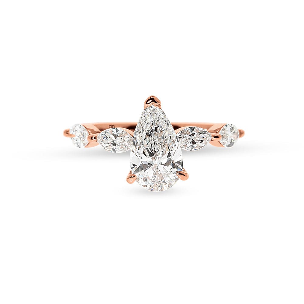 极光梨形钻石带隐藏光环和马眼形辅石订婚戒指
