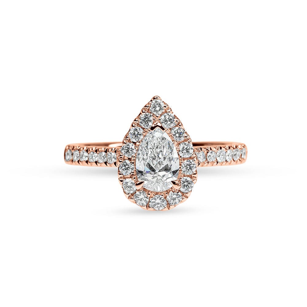 伊丽莎白梨形钻石光环和辅石订婚戒指